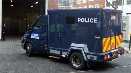 A police van outside Westminster Magistrates' Court, London, as nine men arrive to appear in court charged with conspiracy to cause explosions in the United Kingdom and other terrorism offenses on Monday. Earlier, British police charged nine men with conspiring to cause explosions in what they described as an extensive terror plot against UK targets.
